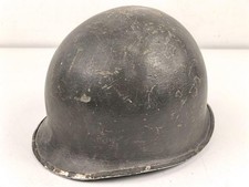 U.S. WWII steel helmet shell, front seam. Reused by U.S. Army after WWII. Unclea