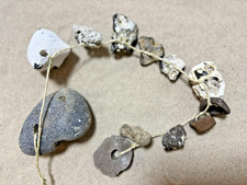 Hühnergott Kette, 11