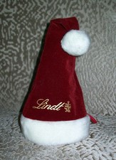 (1281) Weihnachtsmannmütze weinrot als Geschenkbeutel von Lindt (leer)