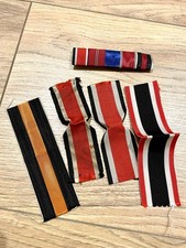 Ordensbänder und Bandspange.