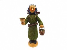 Moosfrau mit Kerzenhalter