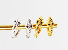 Gold Serpent Huggie Creolen