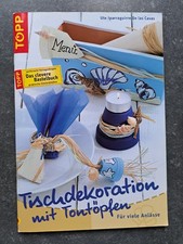 Tischdekoration mit Tontöpfen