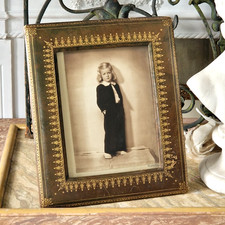 Älterer Stellrahmen, Leder mit Goldprägung