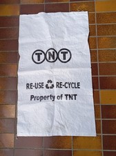 Vintage Gewebter TNT Werbung