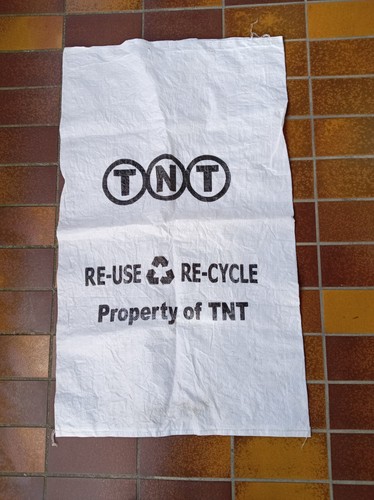 Vintage gewebter tnt - gewebter, werbung