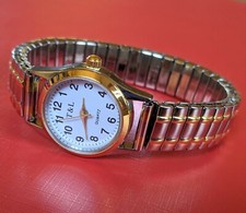 Quarz UHR Flexband Zugarmband