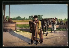 Ungarischer Pferdehirte enzündet sich eine Pfeife, Tracht, Ansichtskarte 