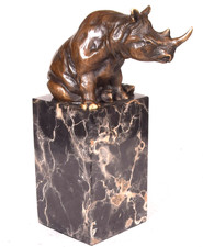 Bronzefigur Nashorn sitzend
