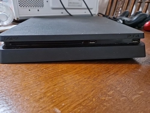 Sony playstation slim 1tb - 4,