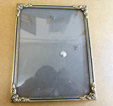 Alter Metallrahmen mit gewölbres Glas