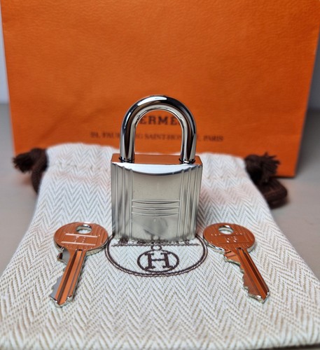 Hermès vorhängeschloss - hermès,