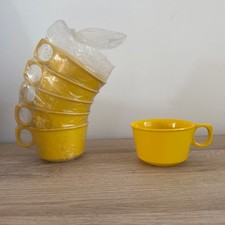 6 gelbe Melanin Tassen Rosti