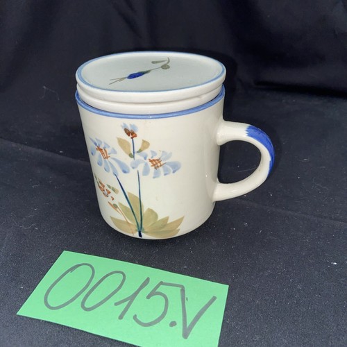 Kräuter teetasse mit sieb und - kräuter,