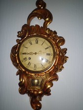 Alte mechanische Cartelluhr