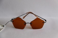 AUSGEFALLENE SONNENBRILLE RAHMENLOS GLÄSER ORANGE FÜNFECK STERN