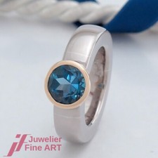 Ring - modern - mit 1 Blautopas - Topas - 18K/750 Gelbgold - Weißgold