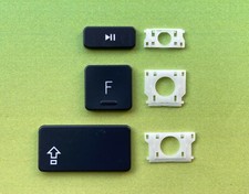 Taste key logitech - /,