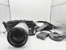 Olympus Pen E-P3 + Olympus 14-150mm