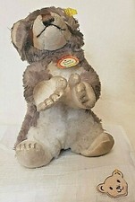 Steiff 6620,00 - Raccy Waschbär 20cm Dralonplüsch grau/weiß/braun aufwartend KF