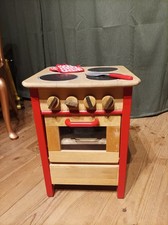 Süßer Spielzeug-Holzofen –