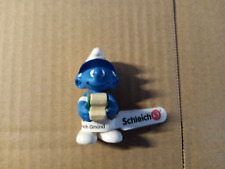 Schlümpfe  Gummifigur- von Schleich (recht gut ) Schlumpf mit Kassenblock