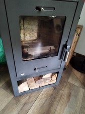 Ofen mit Rohre und Hitze Schutzplatte,und 1 Ster Holz