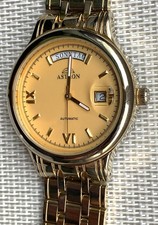 Astron Automatik Uhr – Gold beschichtet – Day-Date – Glasboden – 40 mm