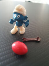 Original Eierlaufschlumpf Peyo 1983, mit Löffel und hellrotem Ei (REP), Ferrero