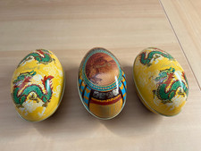 Lindt-Eier aus Blech mit unterschiedlichen Motiven