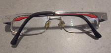 Puma Brillenfassung Model Youngblood silber/rot Logo seitlich Damen Nr. 4113