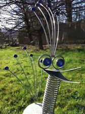 Edelstahl Vogel , Steinvogel