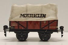 Märklin Spur 0 - Hochbordwagen mit Plane 2-achsig. Blech.