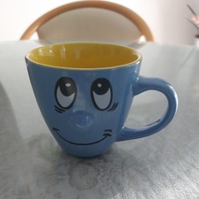 Vintage Funny Face Winds Tasse Mug bedruckt, blau mit Gesicht innen gelb