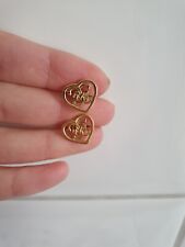 Goldene Herzohrstecker Von Guess Mit Logo