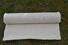 Webteppich naturweiß aus