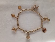 Bettelarmband Armband 585er Gold mit 7 Anhänger Charms