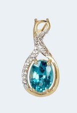 Harry Ivens IV Anhänger GG 585 mit einem blauen Zirkon und weissen Zirkonen