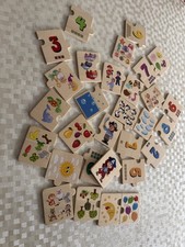 Konvolut Holzspielzeug, Memory, Zahlenlernpuzzle, Würfelpuzzle, Schraubekatze