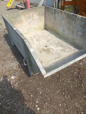 Kran Schutt Mulde von der Firma BAUMANN Kran Baustelle entsorgen