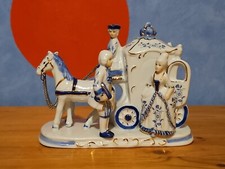 Kutsche aus Porzellan mit 2