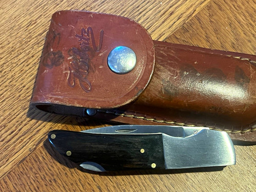 Taschenmesser mit lederhülle - taschenmesser,