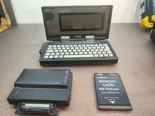 Atari Portfolio with 128KB Memory Card – Vintage 16-Bit Palmtop+ İnterface