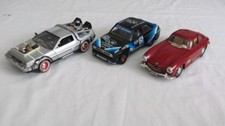 3 Modellautos 1:24