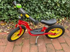 Laufrad von Puky, LR1L in rot, schwarz und gelb, Größe der Räder 9 Zoll 