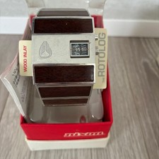 NIXON Rotolog Uhr Edelstahl