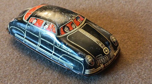 Huki old tin toy - old,