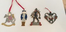 4 vintage Kühn Zinnanhänger