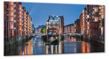 Leinwand Bild Hamburg Speicherstadt Wasserschloss Abendstunde Elster Kanal Hafen