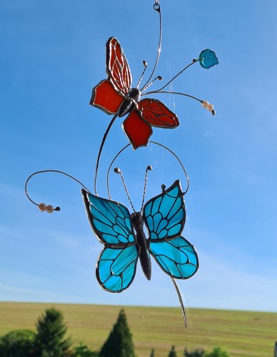 Schmetterlinge auf ast - 2,